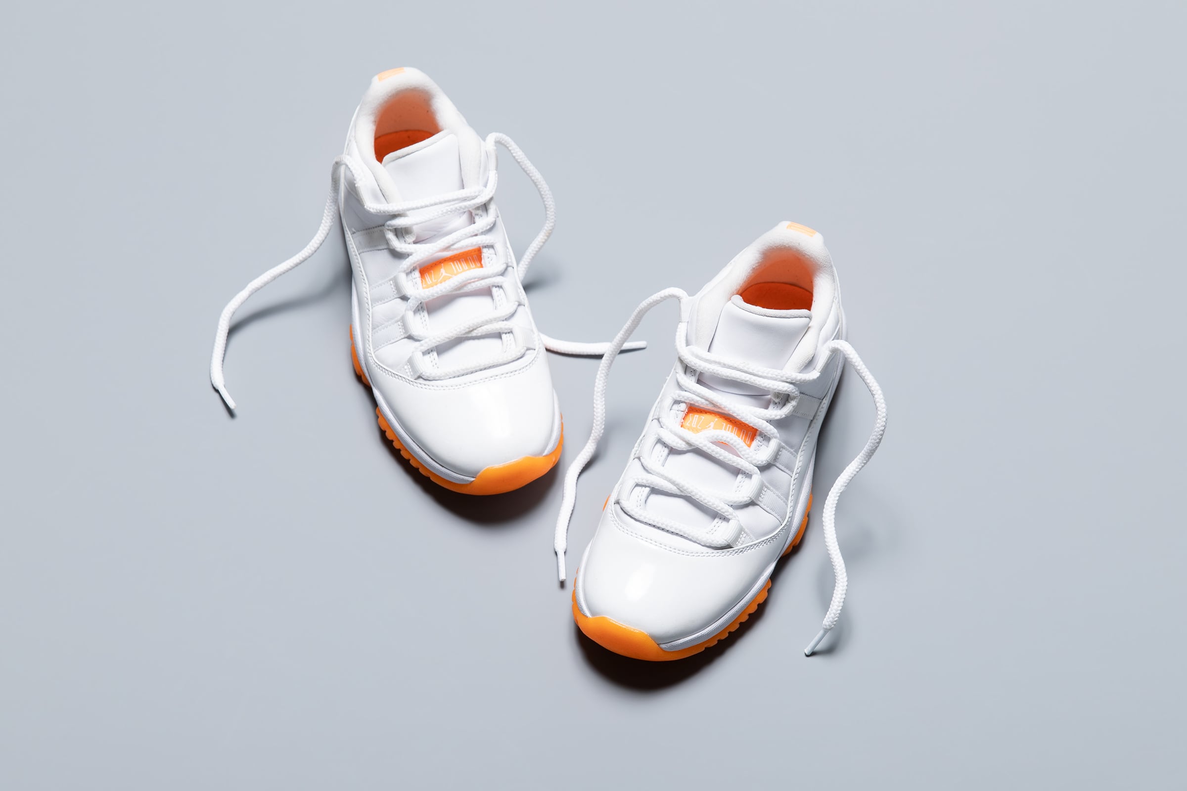 Air Jordan 11 ホワイト/オレンジ NIKE AIR JORDAN 11 LOW | PLAYGROUND | スニーカーショップ