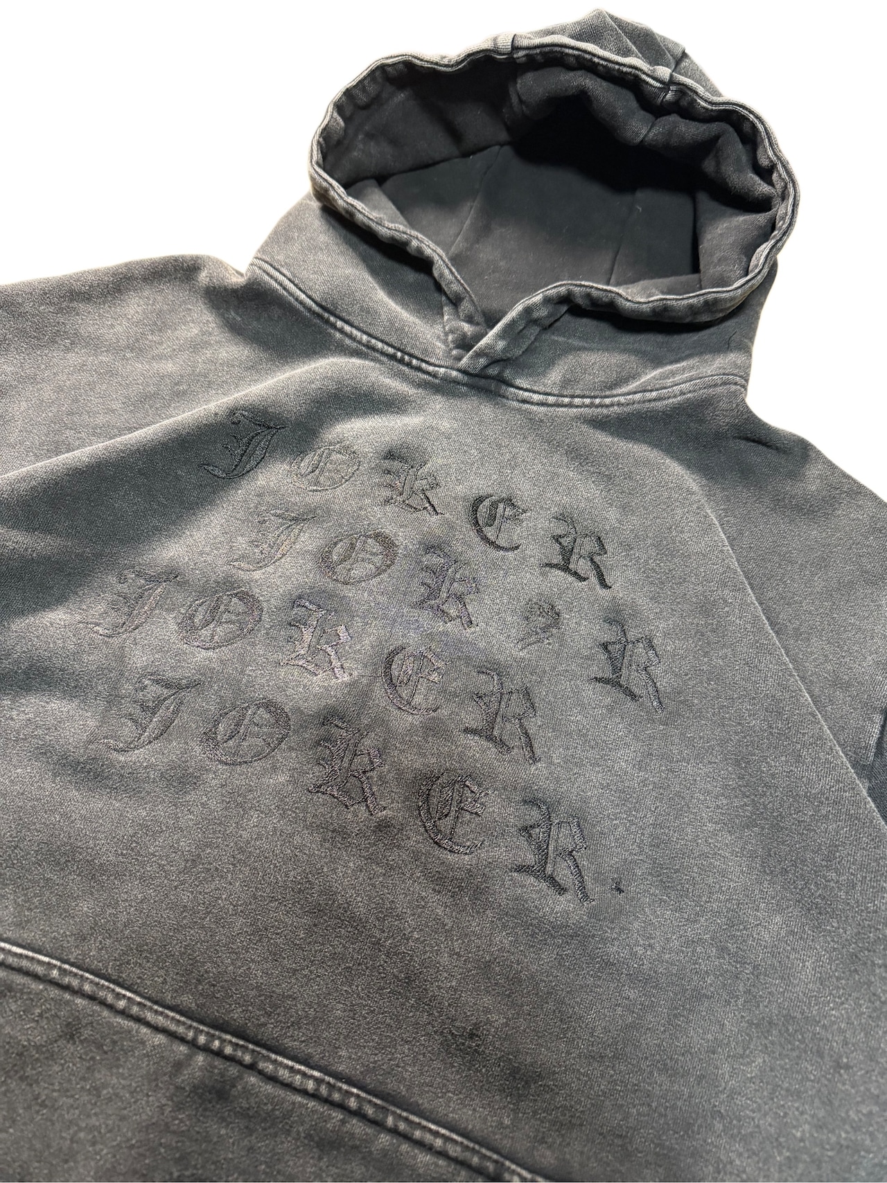 Joker in Between Hoodie