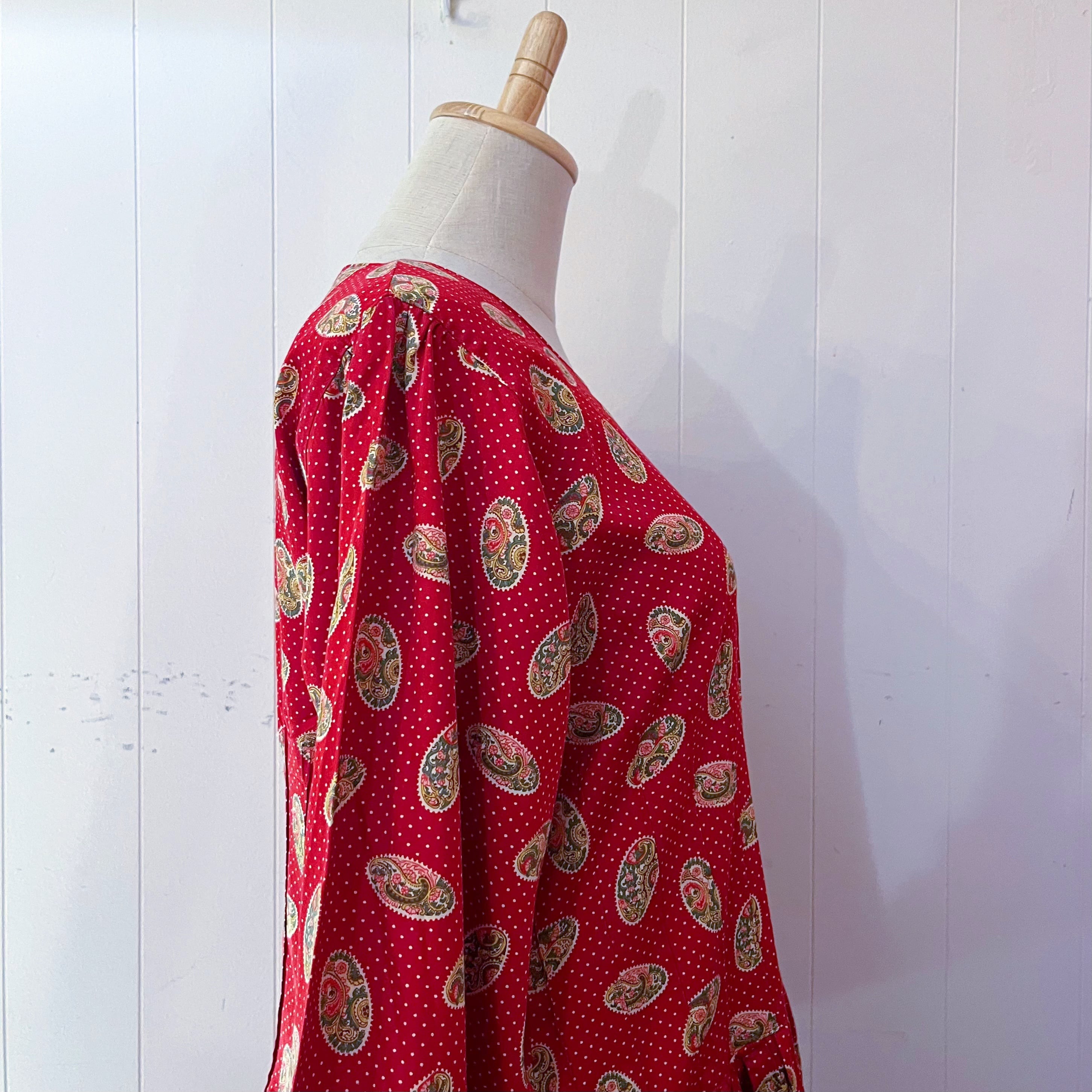 red paisley dot back button one-piece