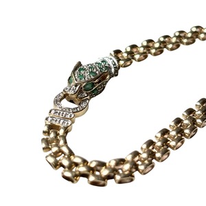 vintage 9ct gold panther head bracelet set with emerald & diamond