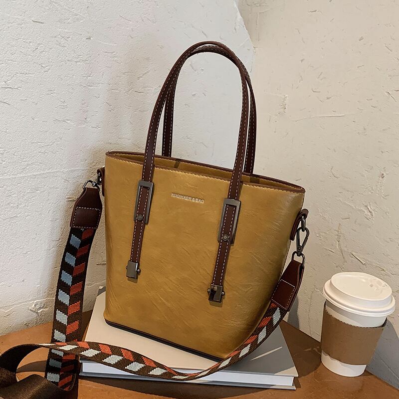 シンプルな大容量バッグ女性2020人気の新しい新しい流行のファッションワイルドネット有名人メッセンジャーポートスタイルレトロバケットバッグ Tiancai_Wing_Bag90115990370