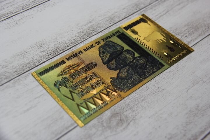 ジンバブエ100兆ドル紙幣 黄金加工レプリカ | OneWorld