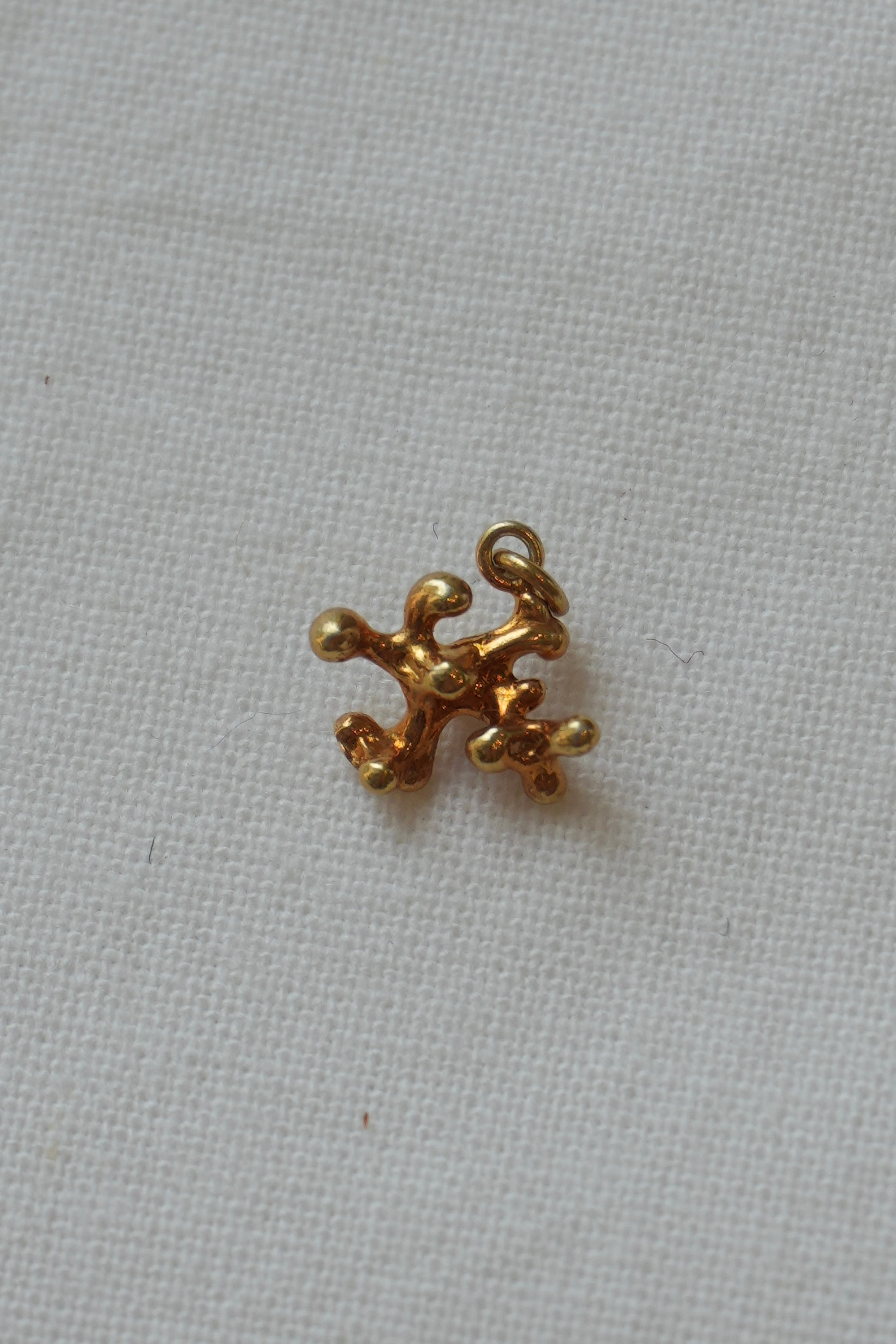charm " sango " ( gold )