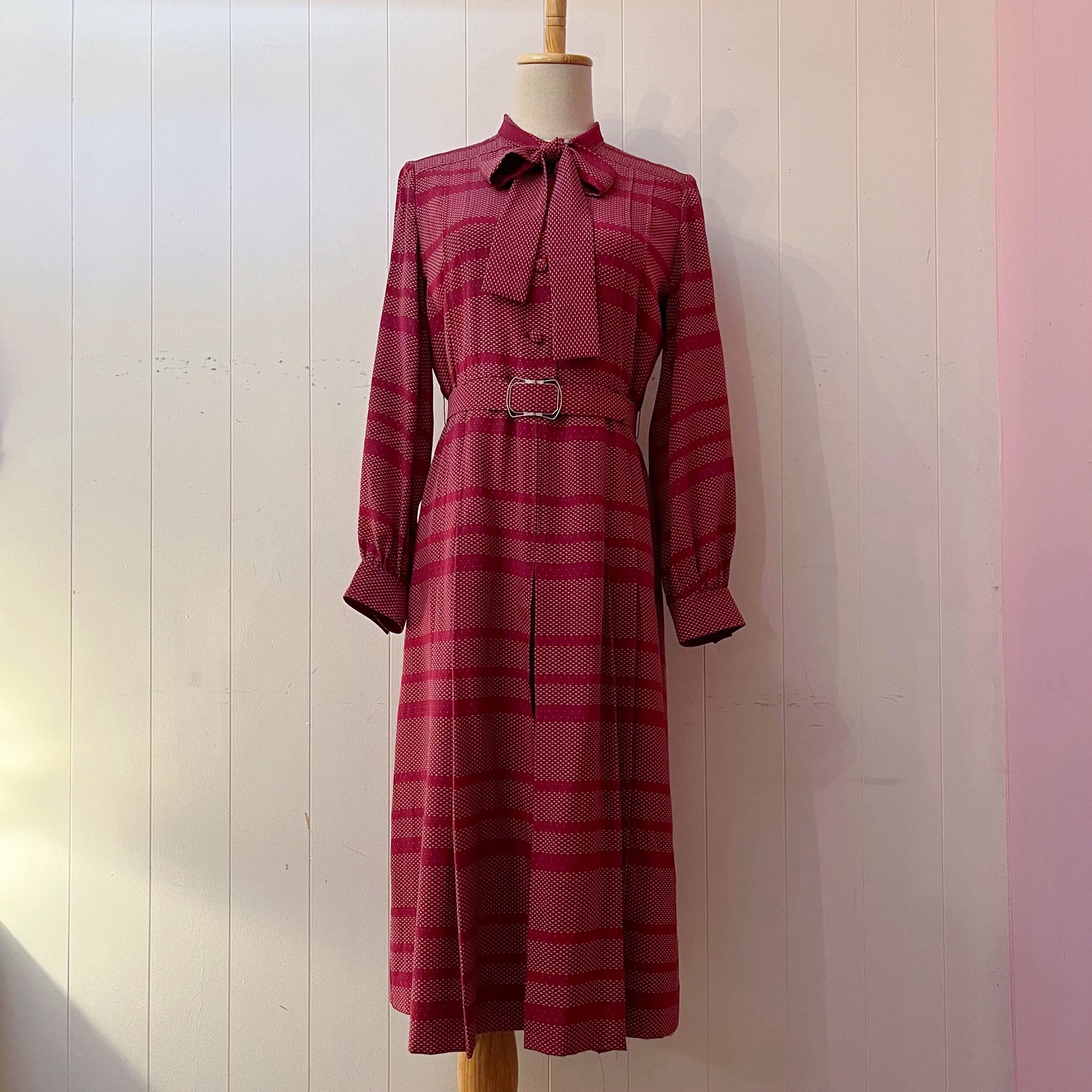 red ribbon tie tuck one-piece