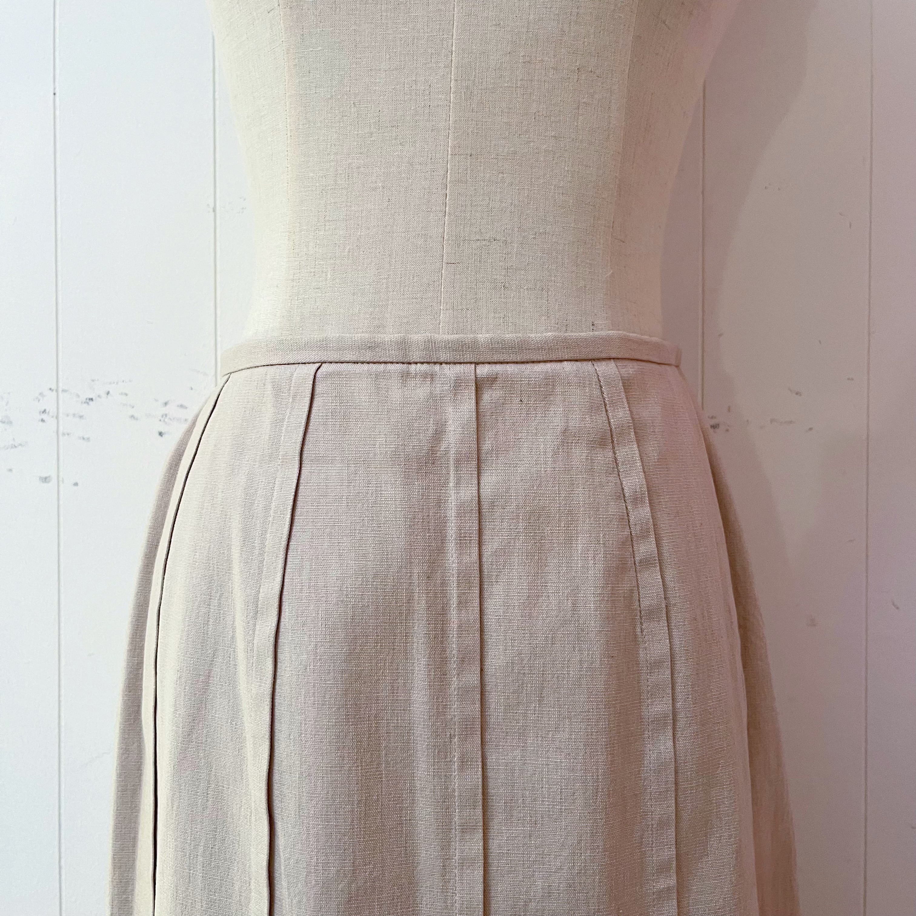 beige pleats side slit long skirt