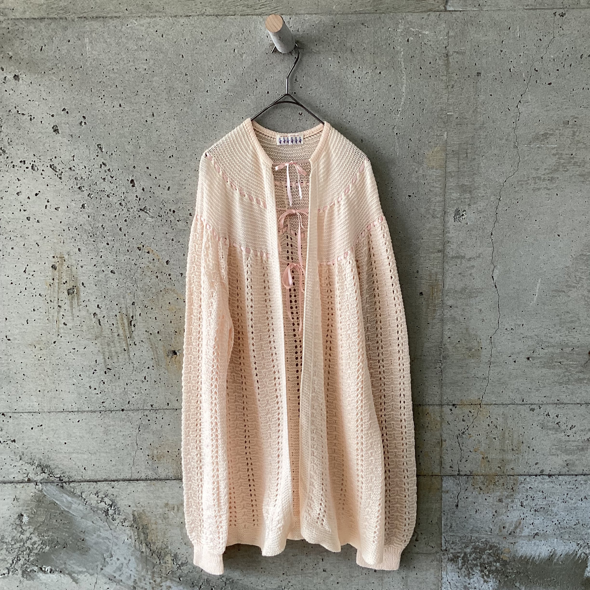 Pink knit cardigan with ribbon