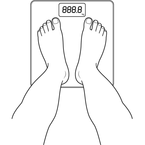 体重計に乗る足