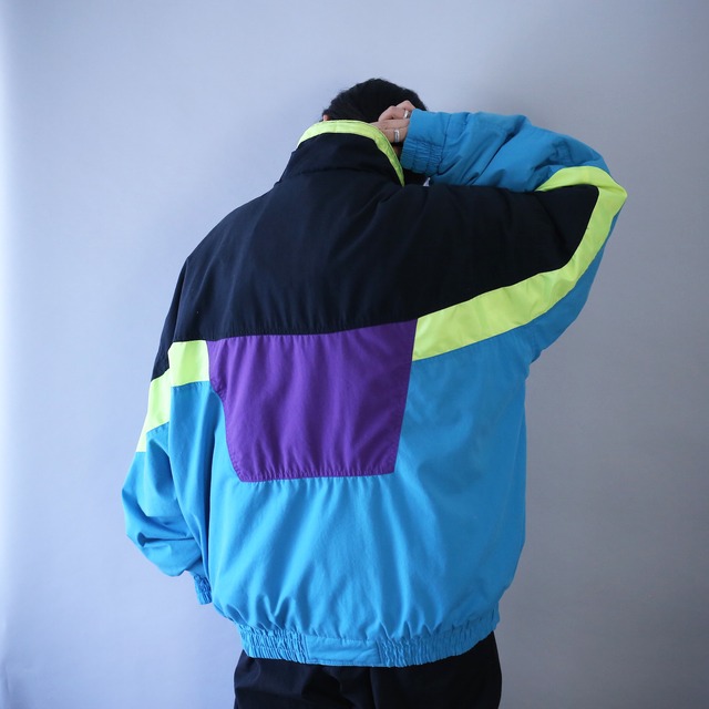 cyber neon color over silhouette zip-up blouson