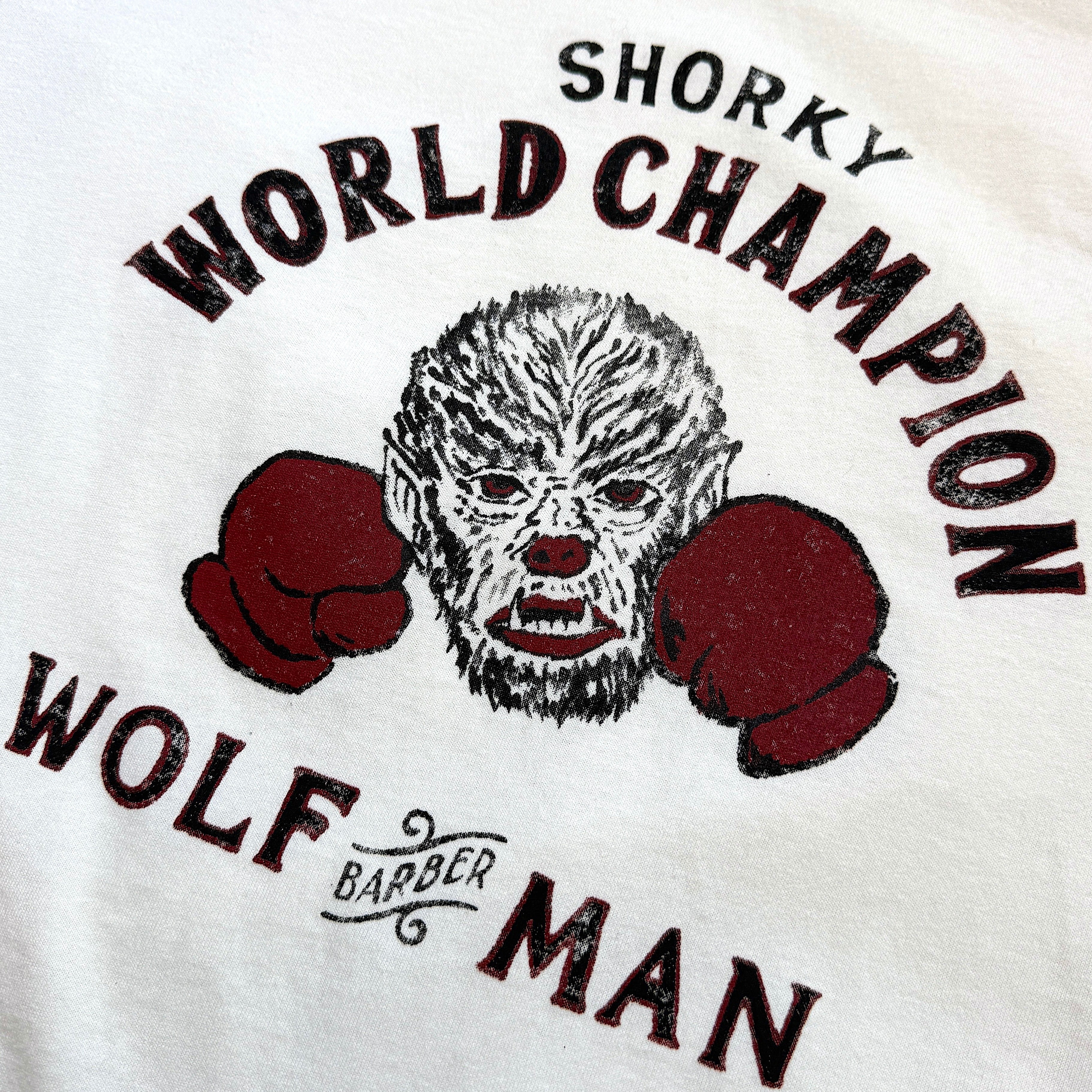 WOLFMAN BARBER SHOP × SHORKY WORLD CHAMPION T-shirt | WOLFMAN