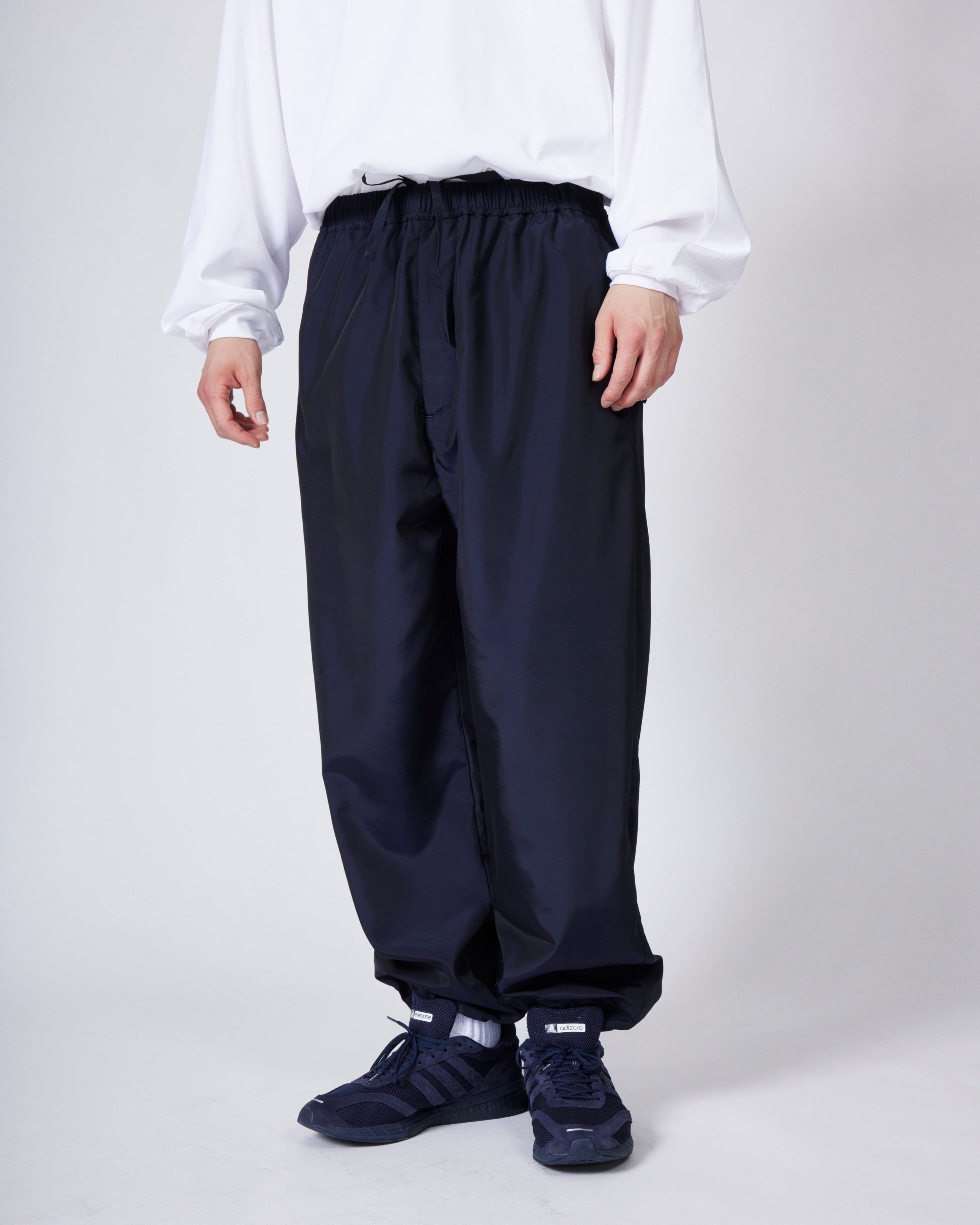 パンツ  TRACK PANT everyone (NAVY) everyone nylon silk track pants (NAVY) | everyone