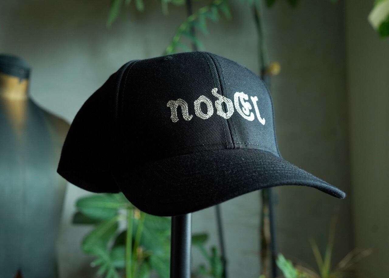 NODEL chain stitch cap (OTTO)
