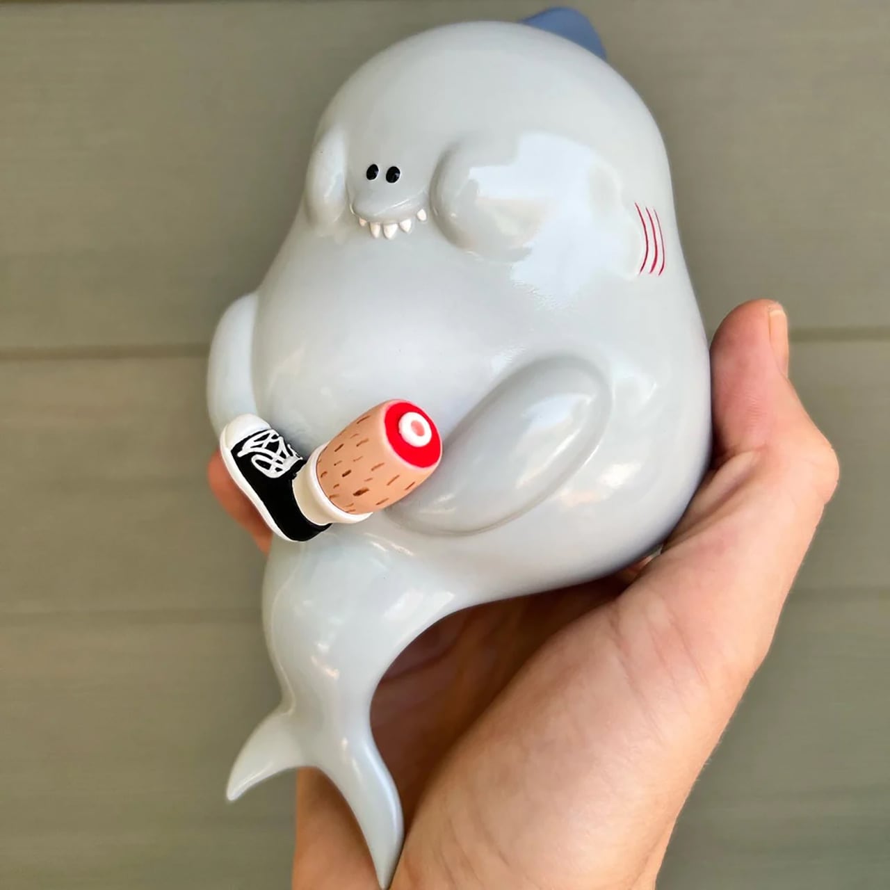 Shelf sitting designer toy 