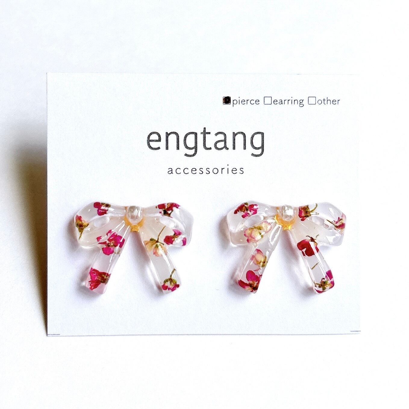 ribbon ( alyssum ) ピアス / イヤリング