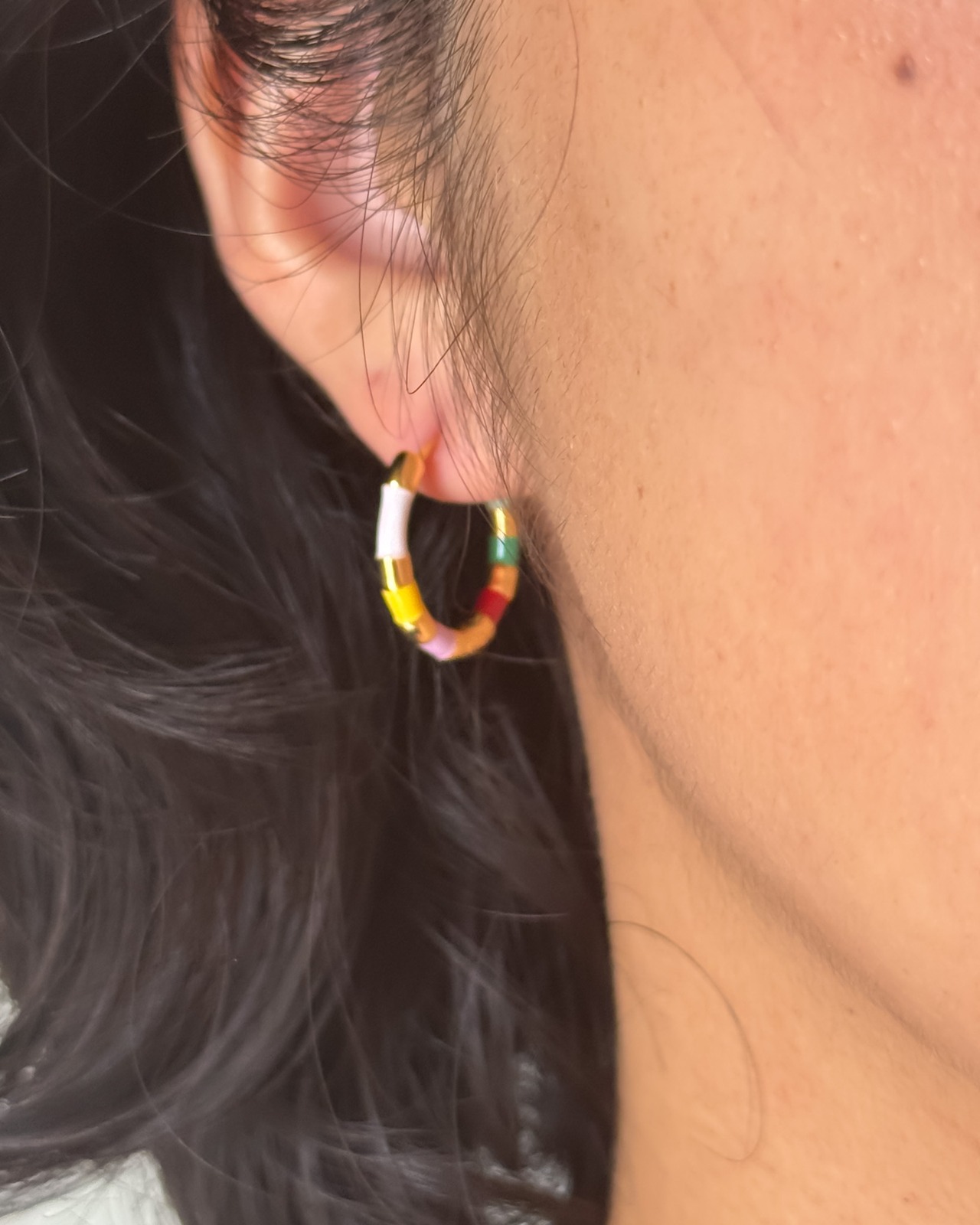 colorful hoop pierce