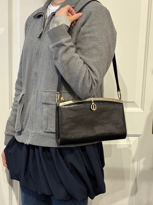 Christian Dior / vintage black leather shoulder bag.