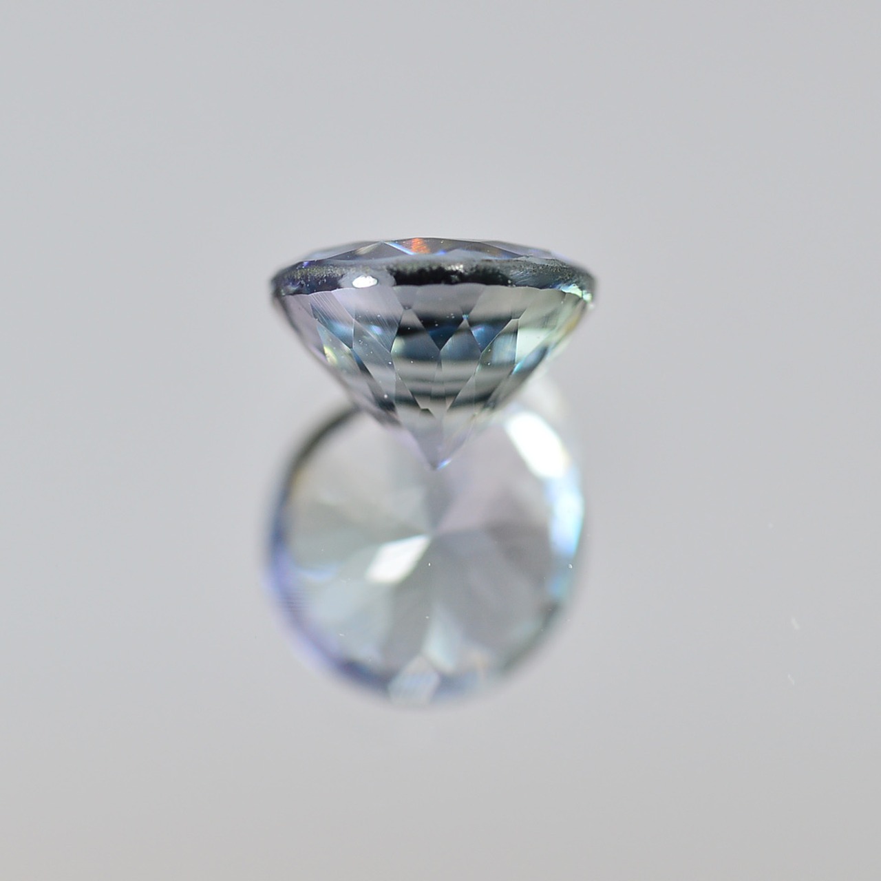 ソ付 非加熱タンザナイト 0.758ct ルース ラウンド バイカラー 系