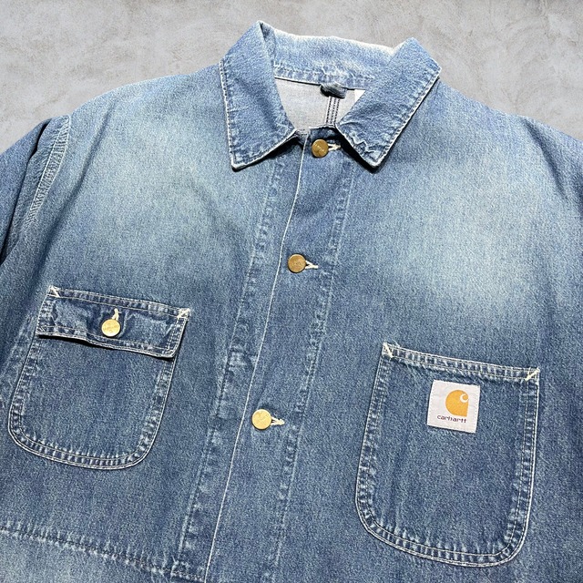 90’s Carhartt Michigan Denim Chore Coat curb