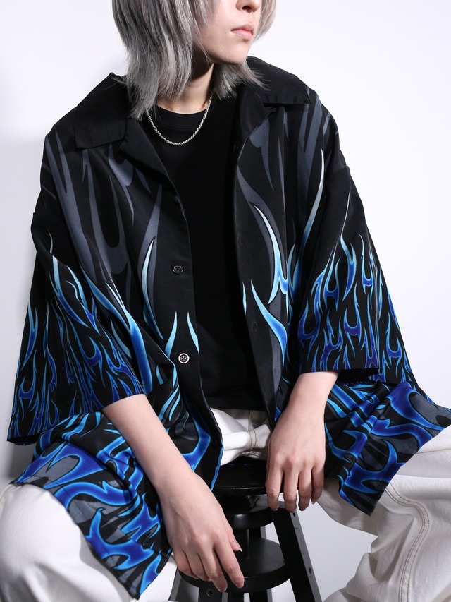 tribal motif blue fire pattern over silhouette s/s shirt