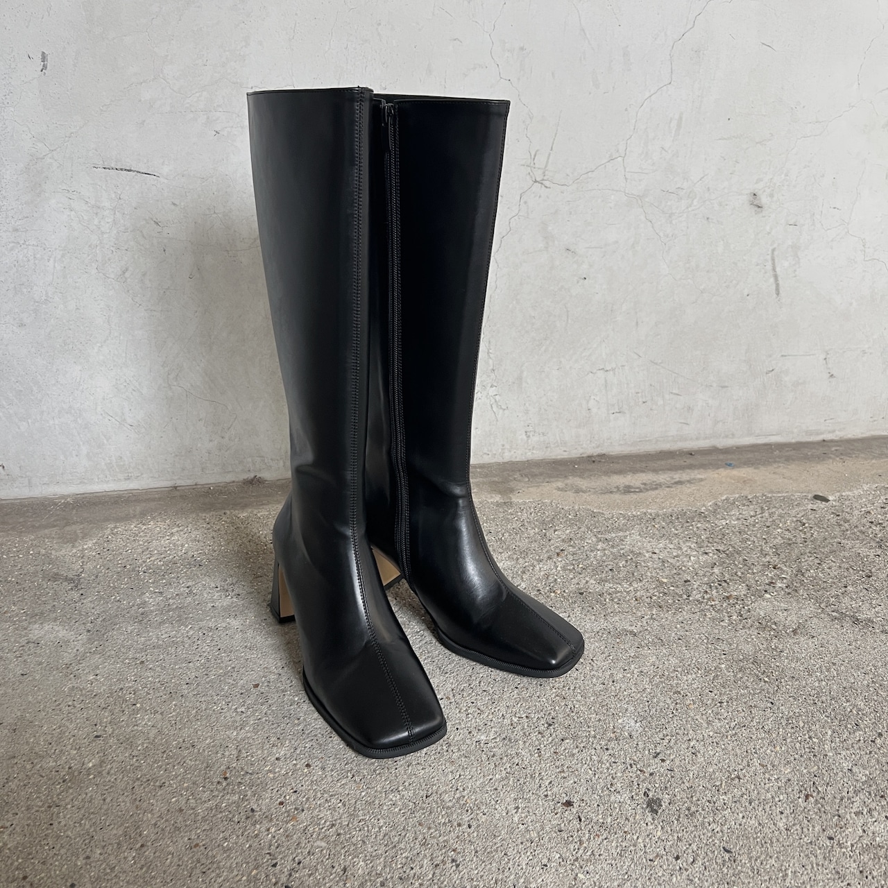 slanted cut heel long boots