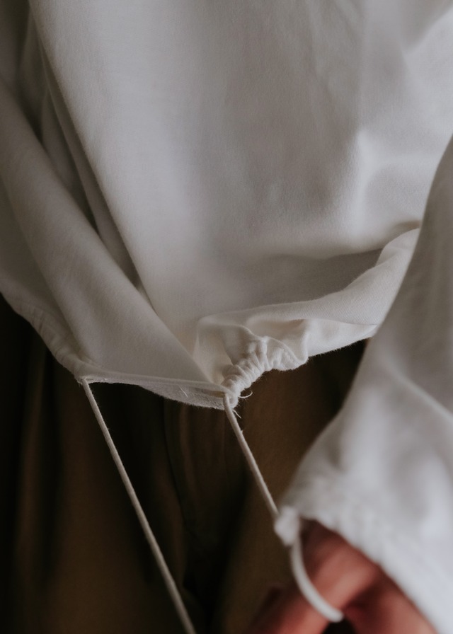 C.P. COMPANY 96SS half zip draw cord hooded sweatshirt by Romeo Gigli