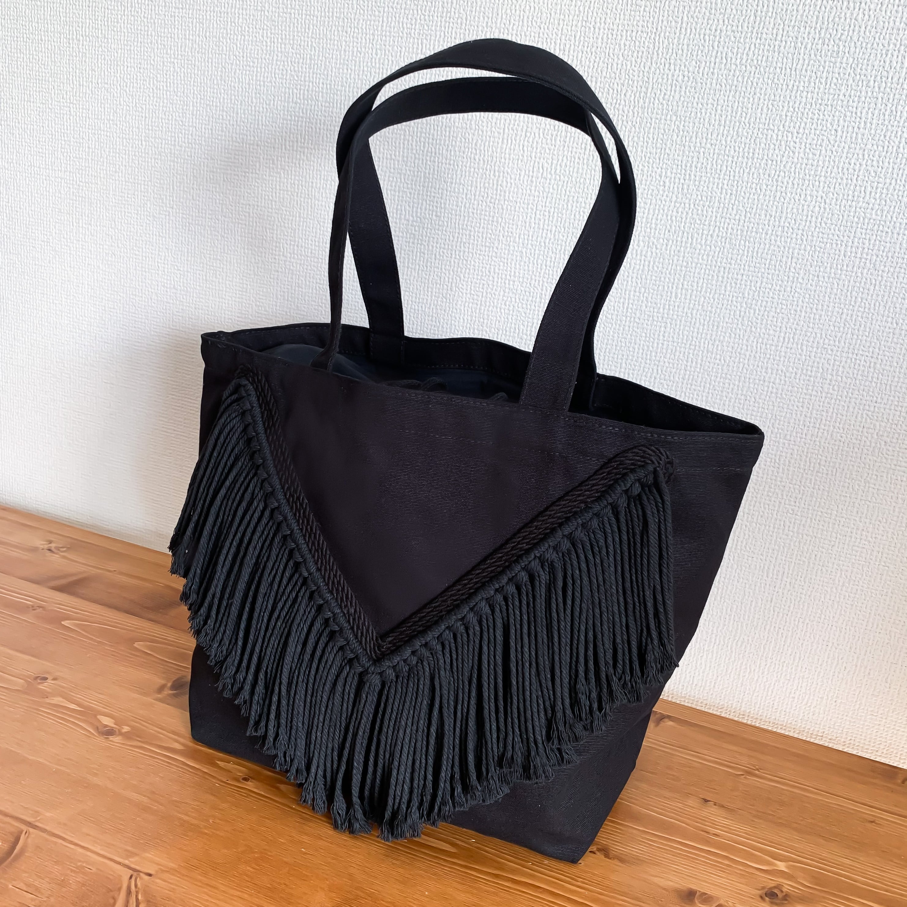 V Fringe Drawstring Tote Bag