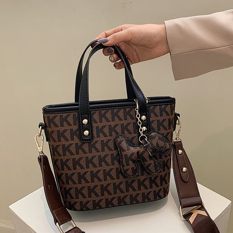 ハンドバッグレディースハンドバッグ2020秋シンプルで用途の広いバケットバッグワイドショルダーストラップメッセンジャースモールバッグトレンド Tiancai_Wing_Bag84511907728