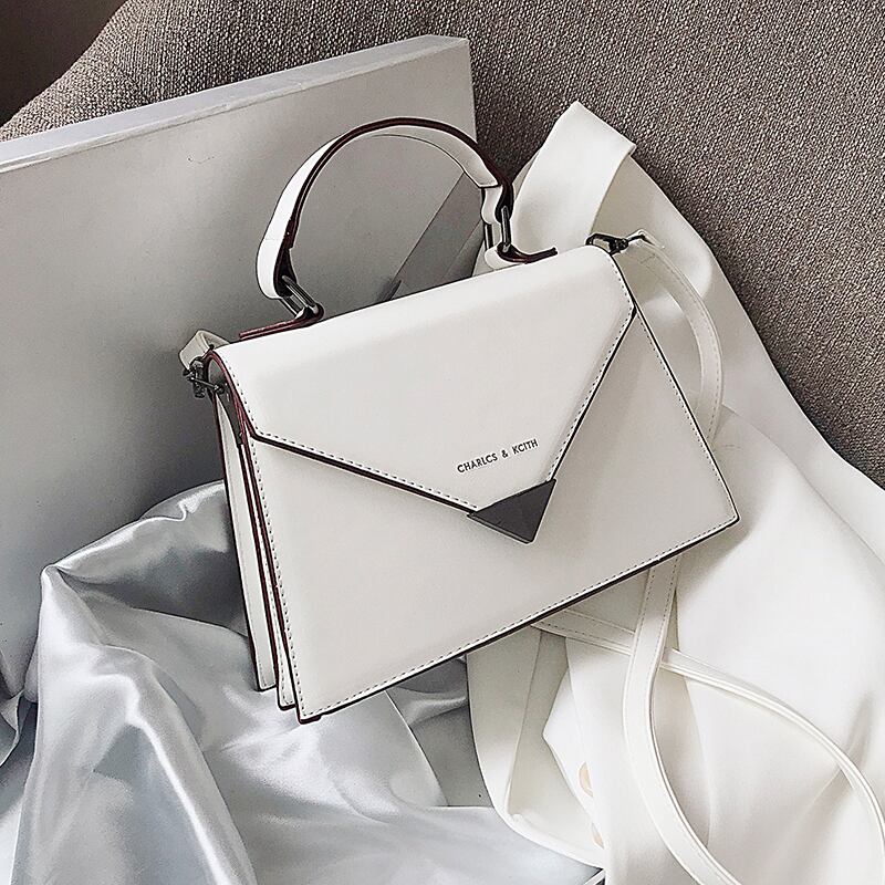 ウエスタンスタイルのハンドバッグのセンスレディースバッグ2020人気の新しい流行のファッションシンプルなワンショルダーメッセンジャーバッグワイルドスモールスクエアバッグ Tiancai_Wing_Bag76478010424