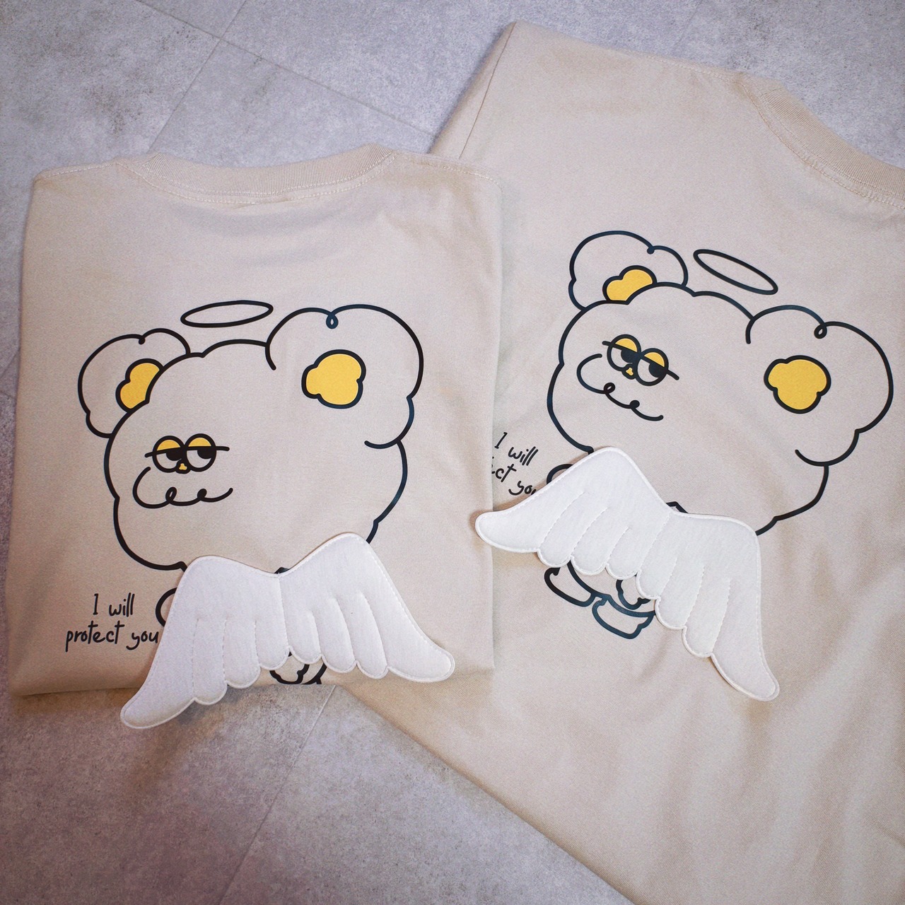 【背中に羽が生えました。】天使の羽 Tシャツ｜Hoooさん 立体刺繍 羽付き キャラクターTee - 1