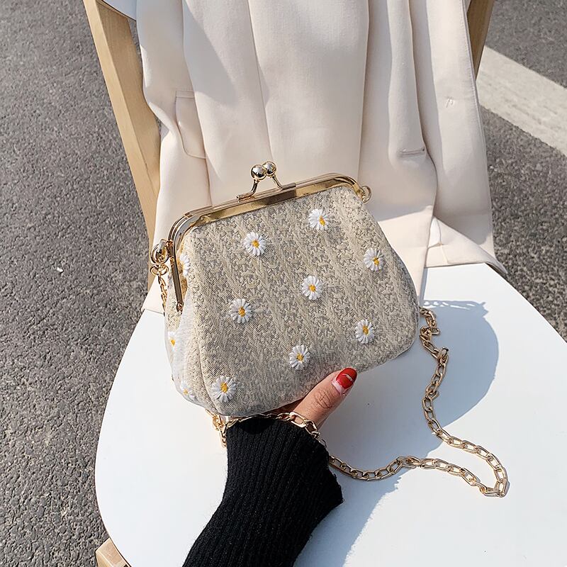 野生のメッセンジャーバッグファッションストロークリップシェルバッグの今年の人気の小さなバッグ女性2020新しい波バージョン Tiancai_Wing_Bag8745444