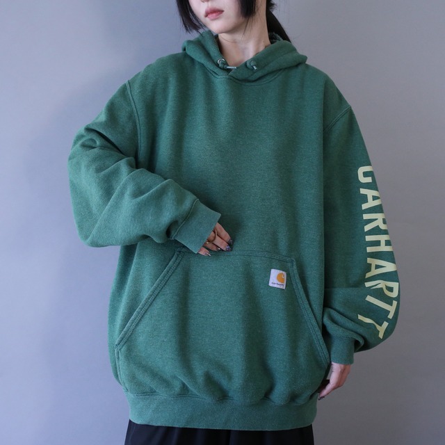 "carhartt" over silhouette sleeve printed sweat pullover