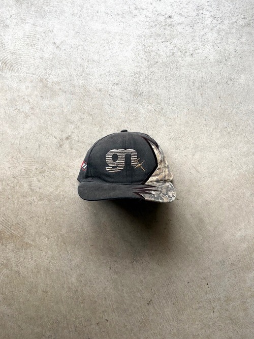 KATI SPORTCAP CAMO BLOCKED 6PANEL CAP “Guy Nielson Co.”