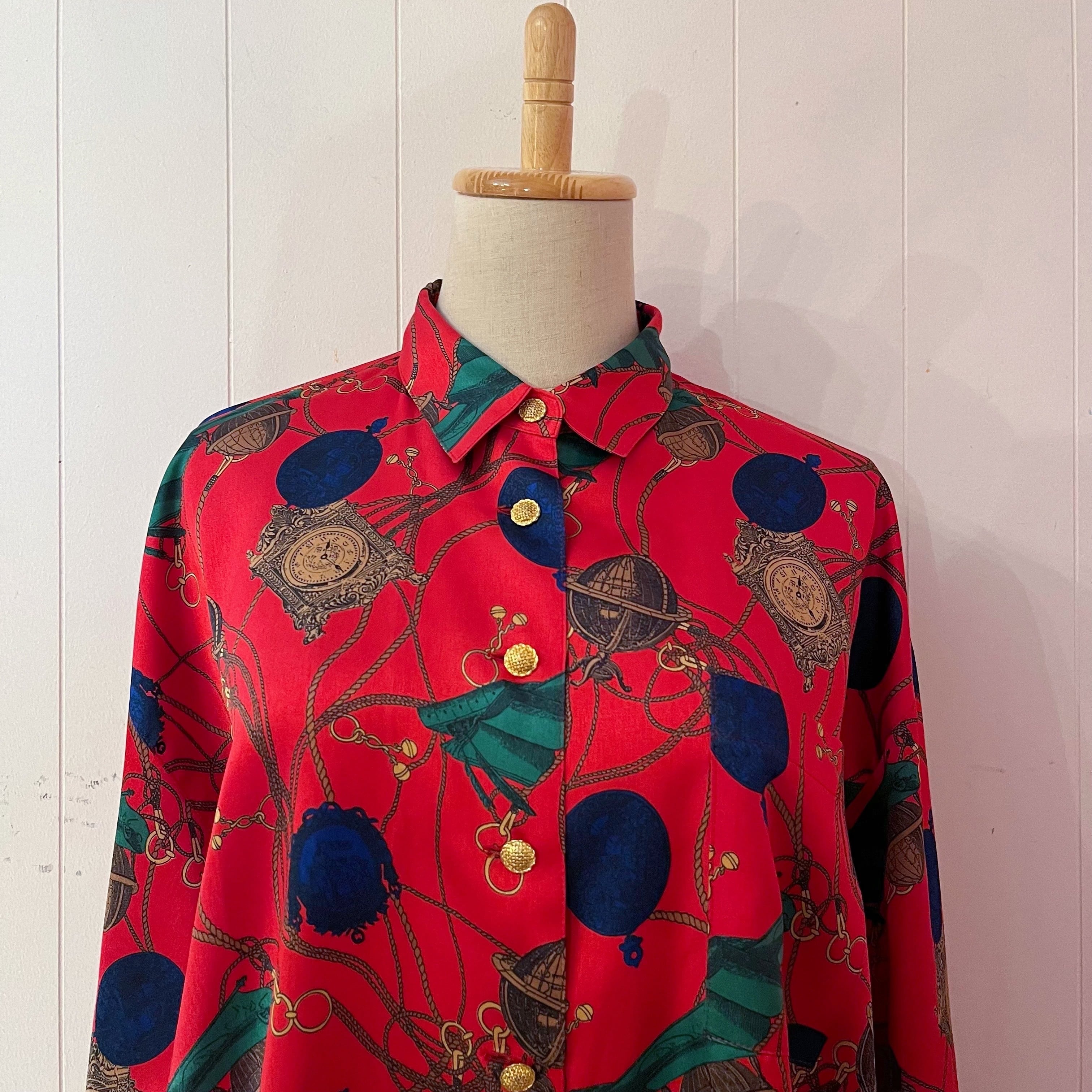 clock and globe red satin blouse