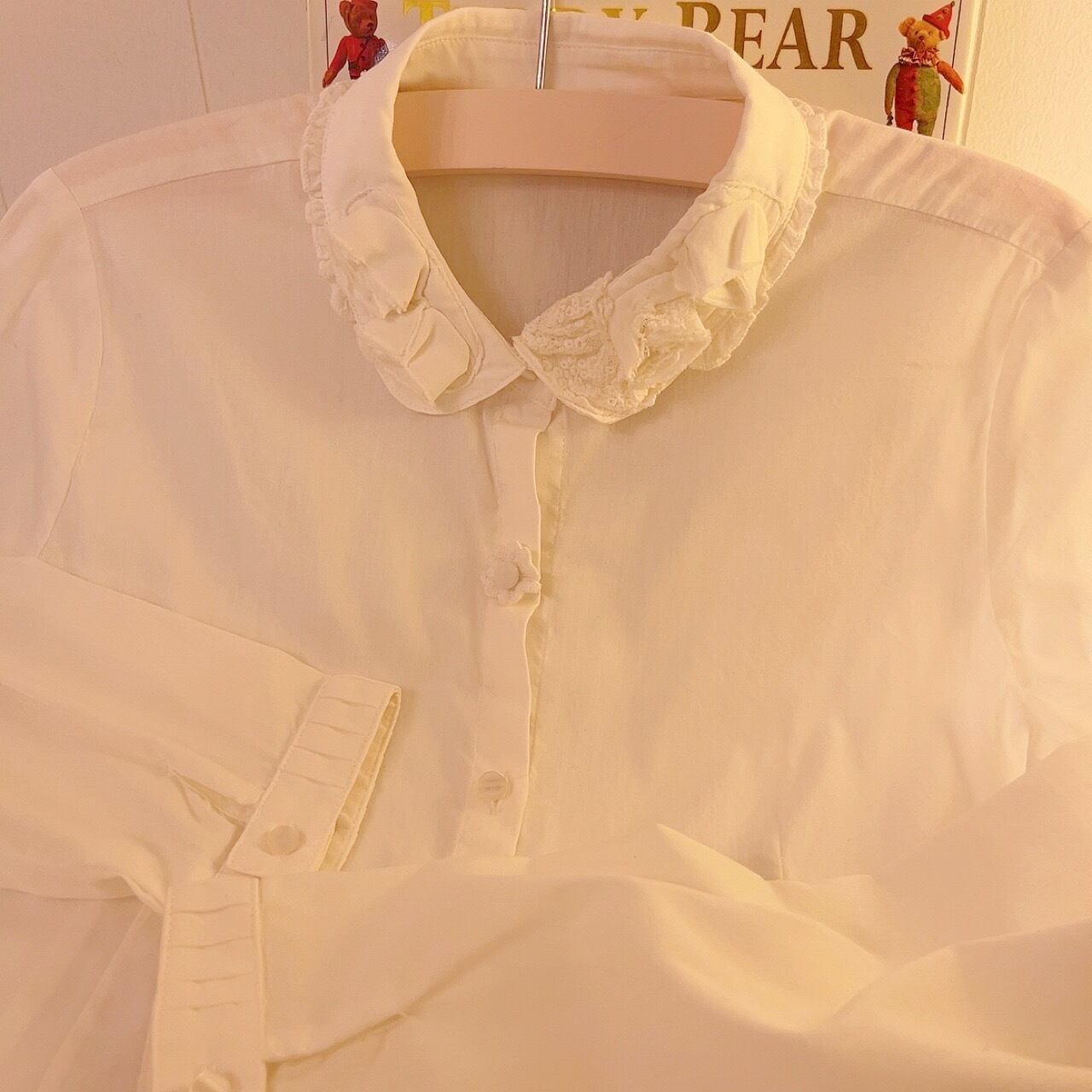 flower button white blouse