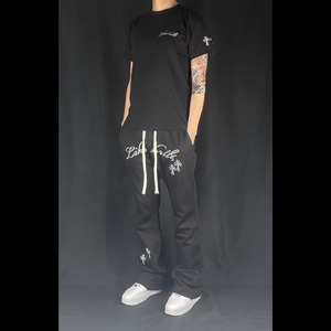 ERDOLADO brand logo white sweat flare pants