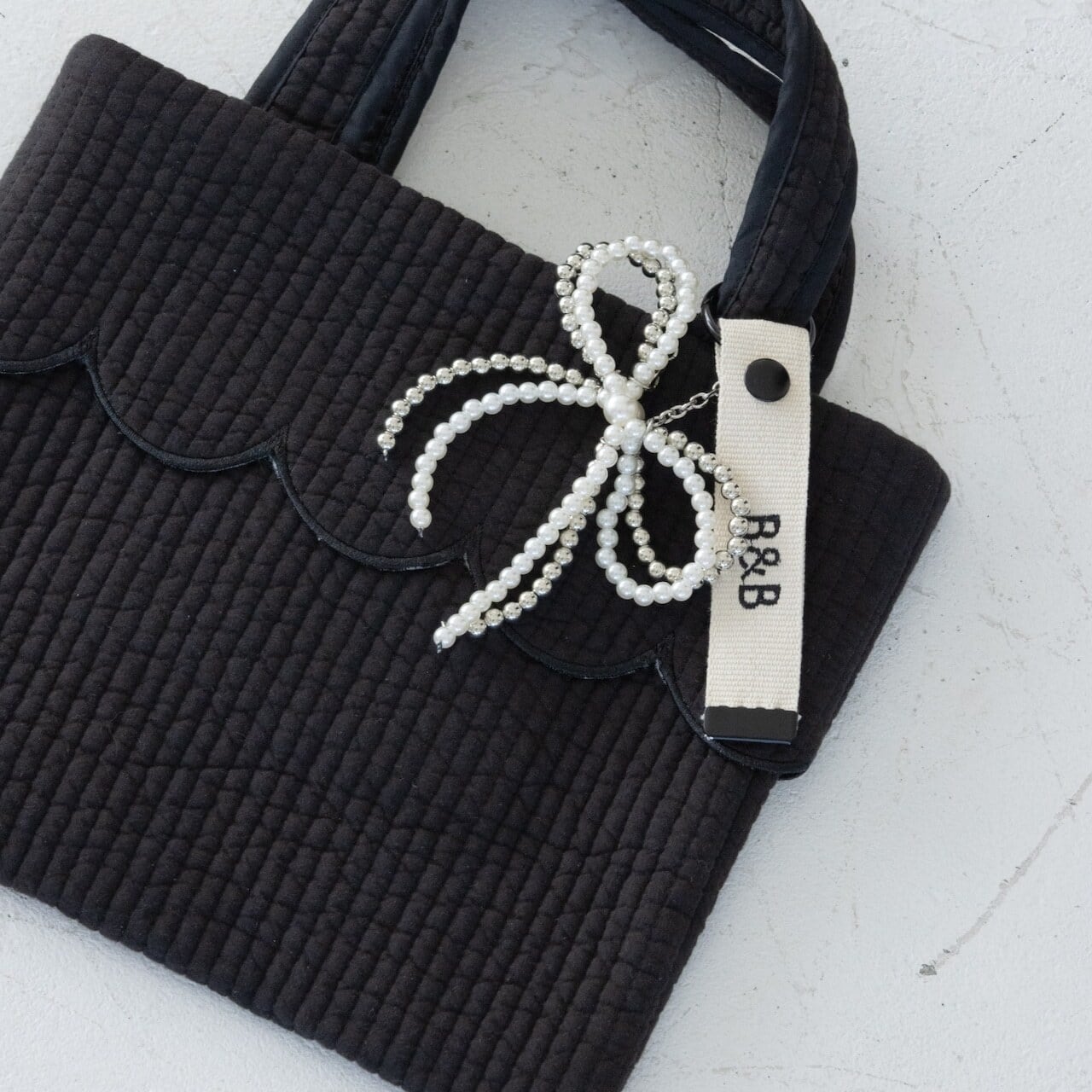 パールリボンチャーム
